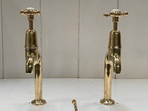 fully restored edwardian vintage bib taps mounted on new brass pedestals