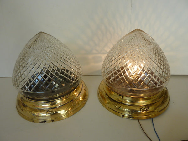a pair of edwardian flush-mounted cut glass bathroom lights c.1920 and a single french cut chrystal lamp c.1920