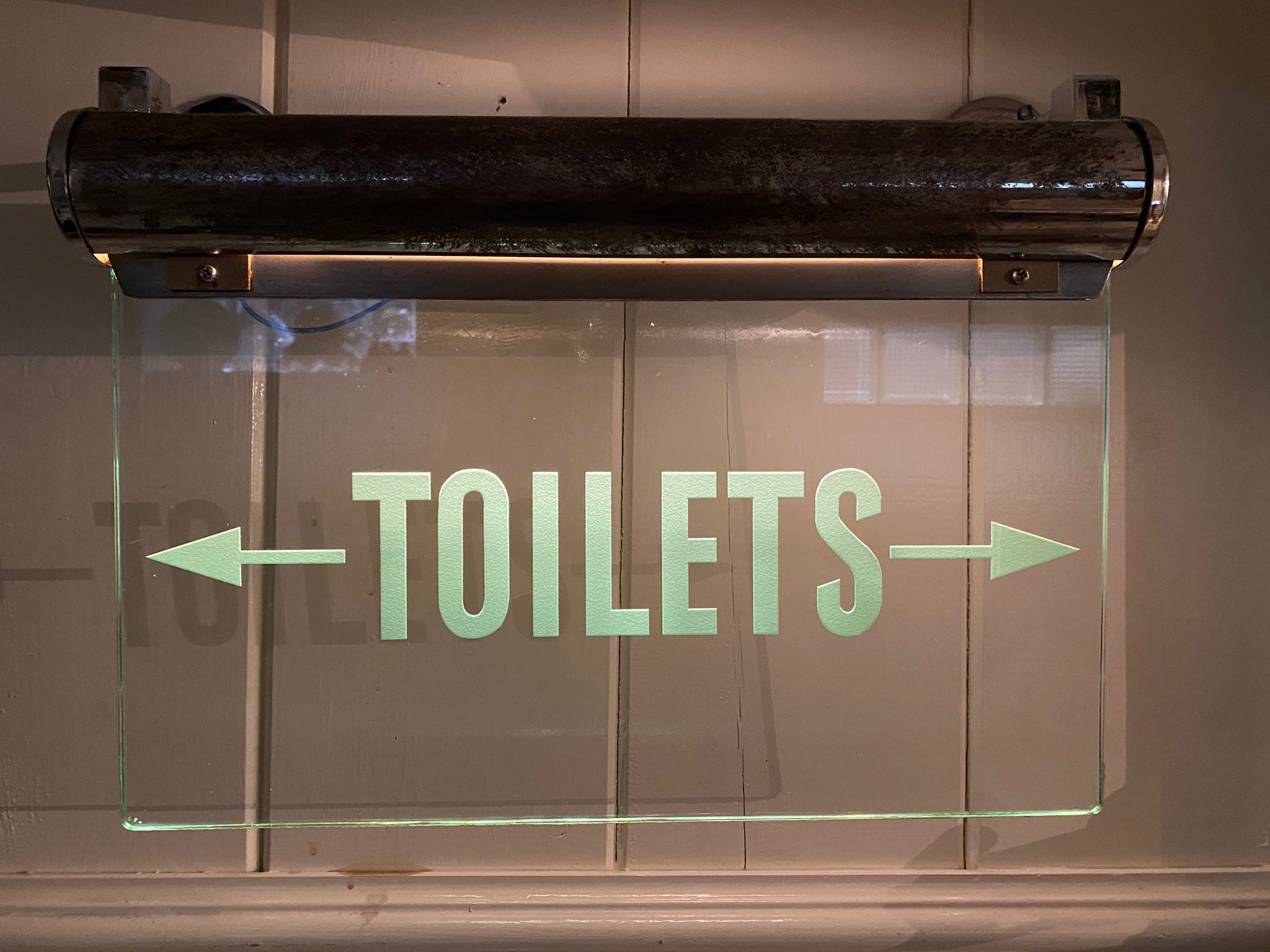 Wall-Fixing Illuminated Glass "TOILETS" Sign C.1930