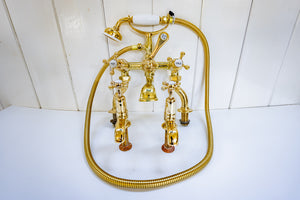 edwardian bath and basin matching tap set in un-lacquered polished brass c.1920