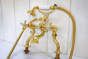 edwardian bath and basin matching tap set in un-lacquered polished brass c.1920