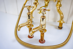 edwardian bath and basin matching tap set in un-lacquered polished brass c.1920