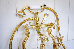 edwardian bath and basin matching tap set in un-lacquered polished brass c.1920