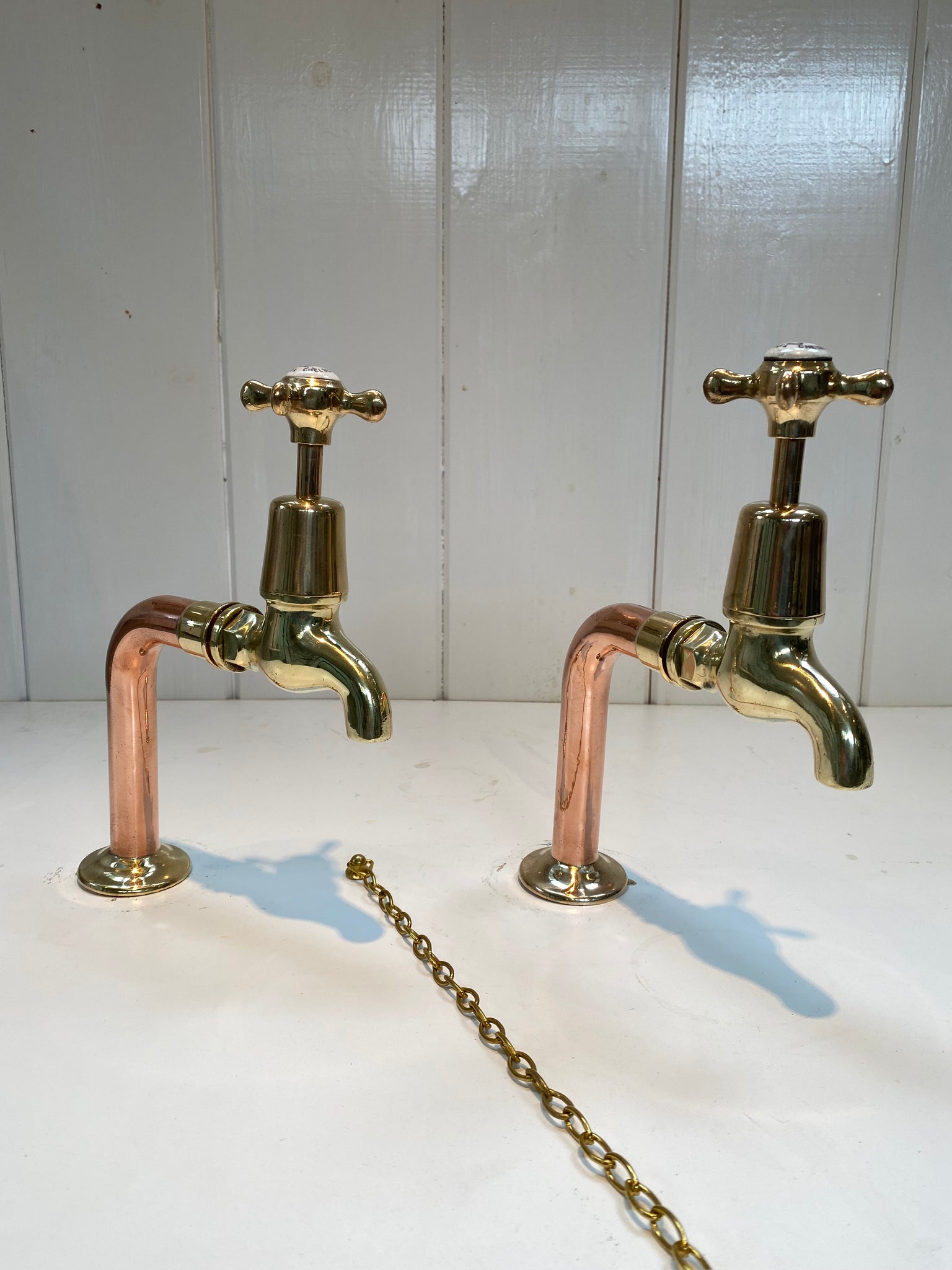 fully restored antique thomas crapper bib taps on original copper pedestals c.1920