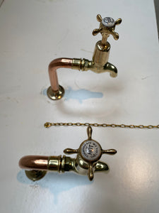 fully restored antique thomas crapper bib taps on original copper pedestals c.1920