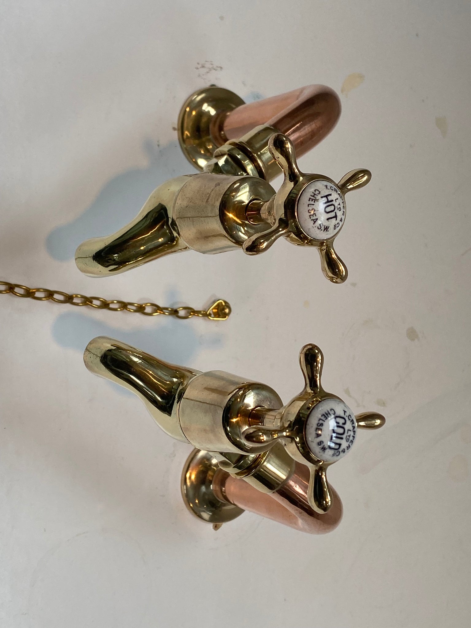 fully restored antique thomas crapper bib taps on original copper pedestals c.1920