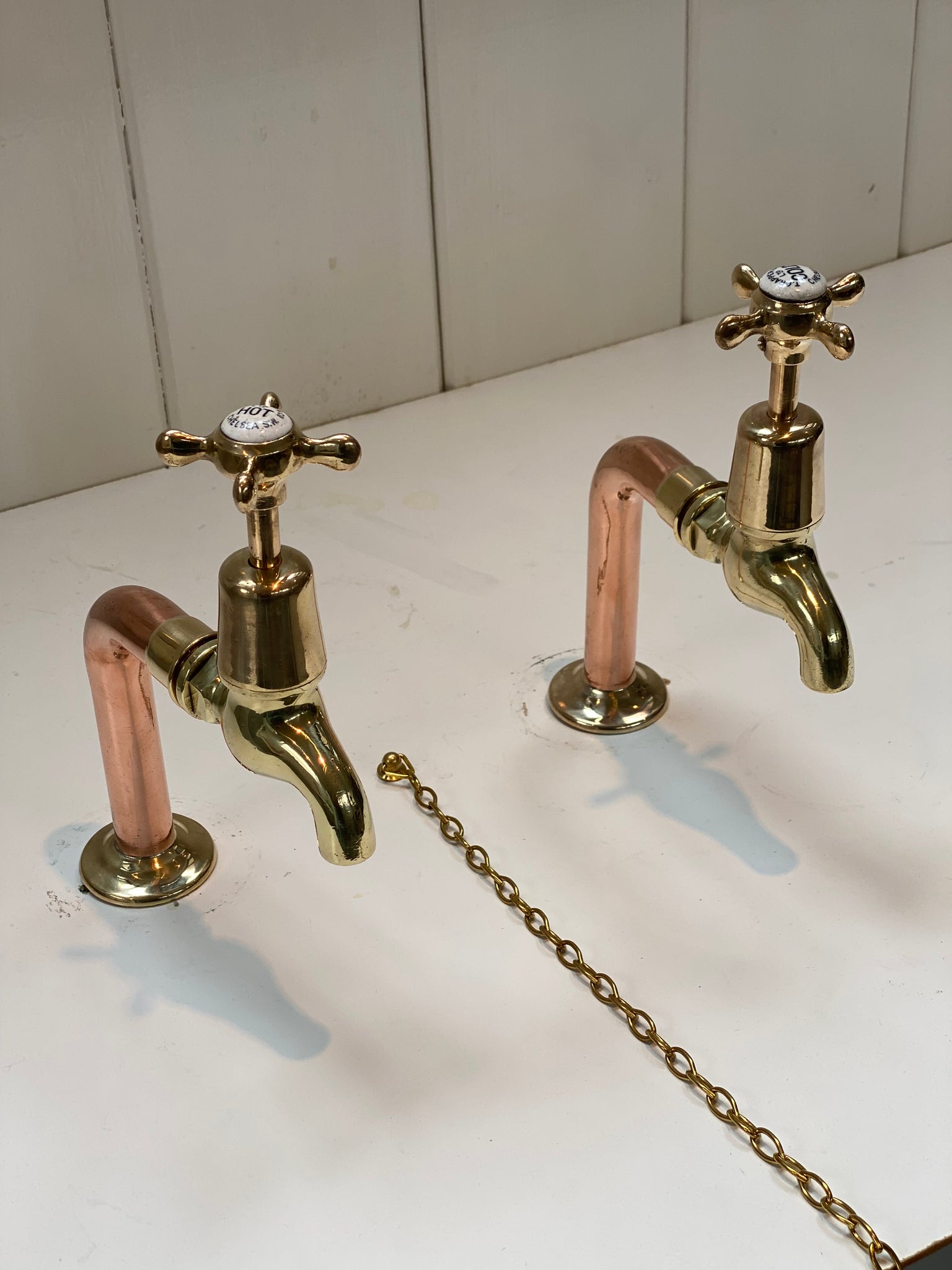 fully restored antique thomas crapper bib taps on original copper pedestals c.1920