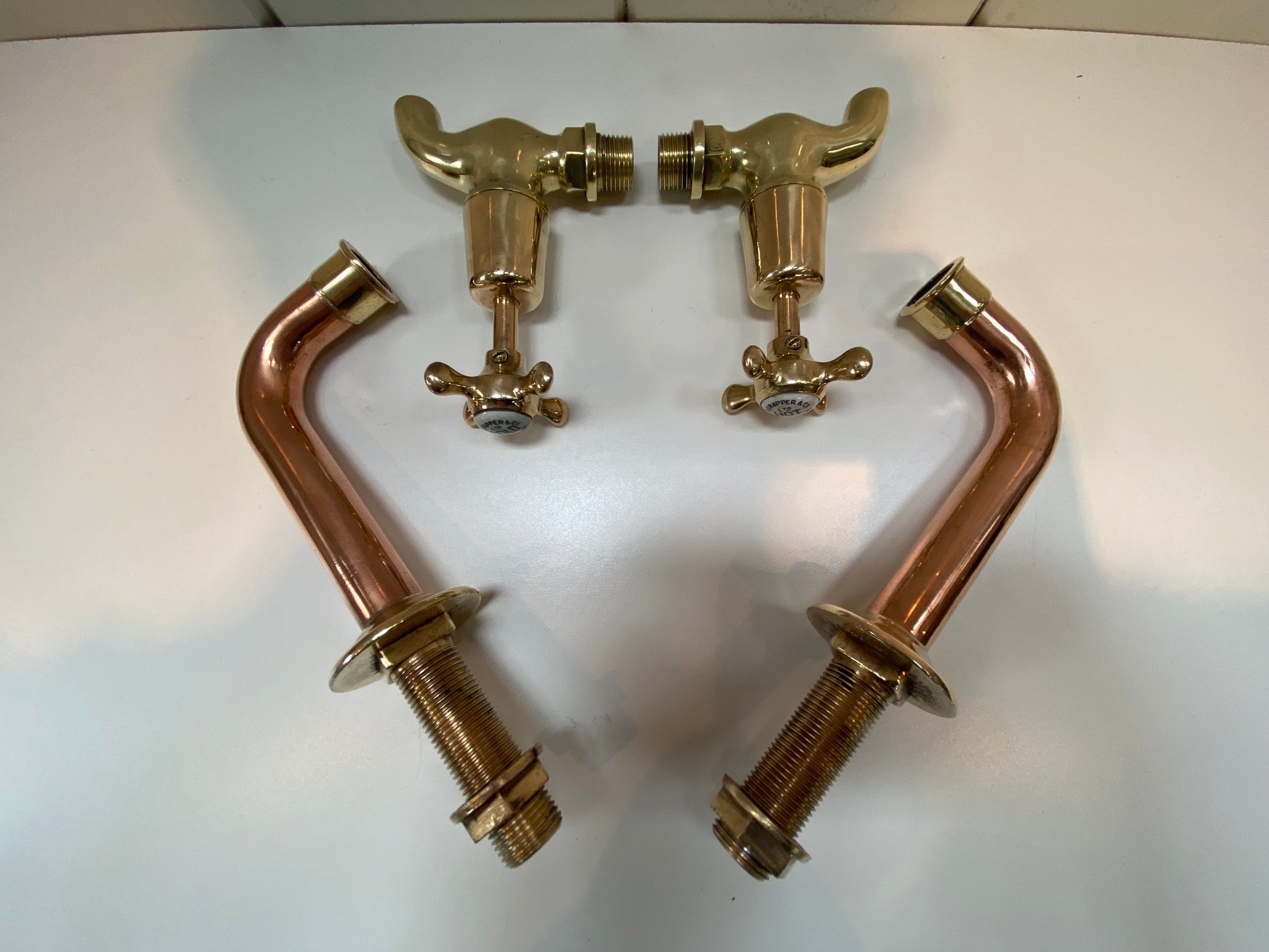 fully restored antique thomas crapper bib taps on original copper pedestals c.1920