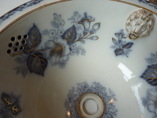 victorian plug basin with lion's head spout & gold leaf