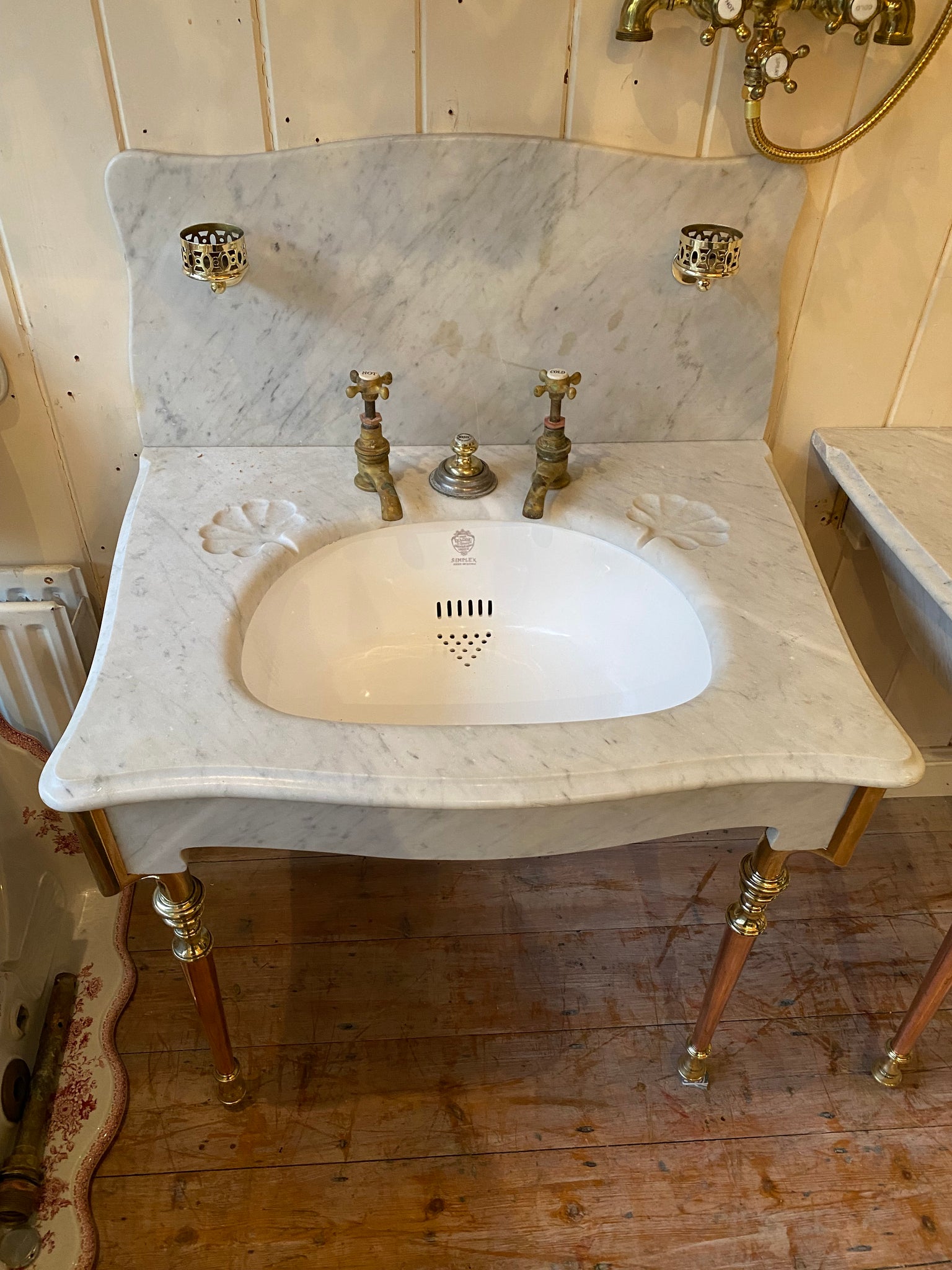 a pair of "simplex" carrara marble basins by j bolding c.1900