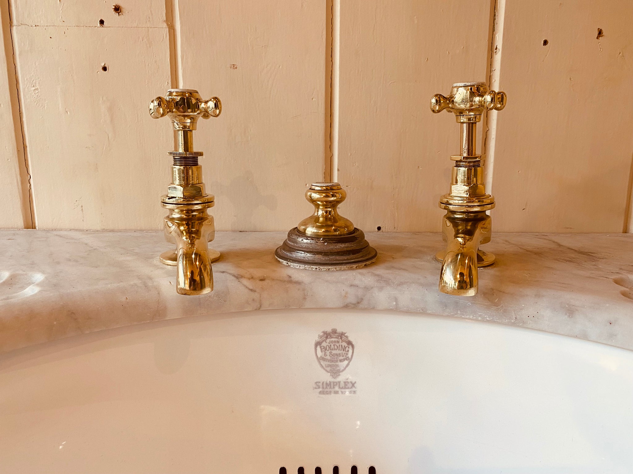 a pair of "simplex" carrara marble basins by j bolding c.1900