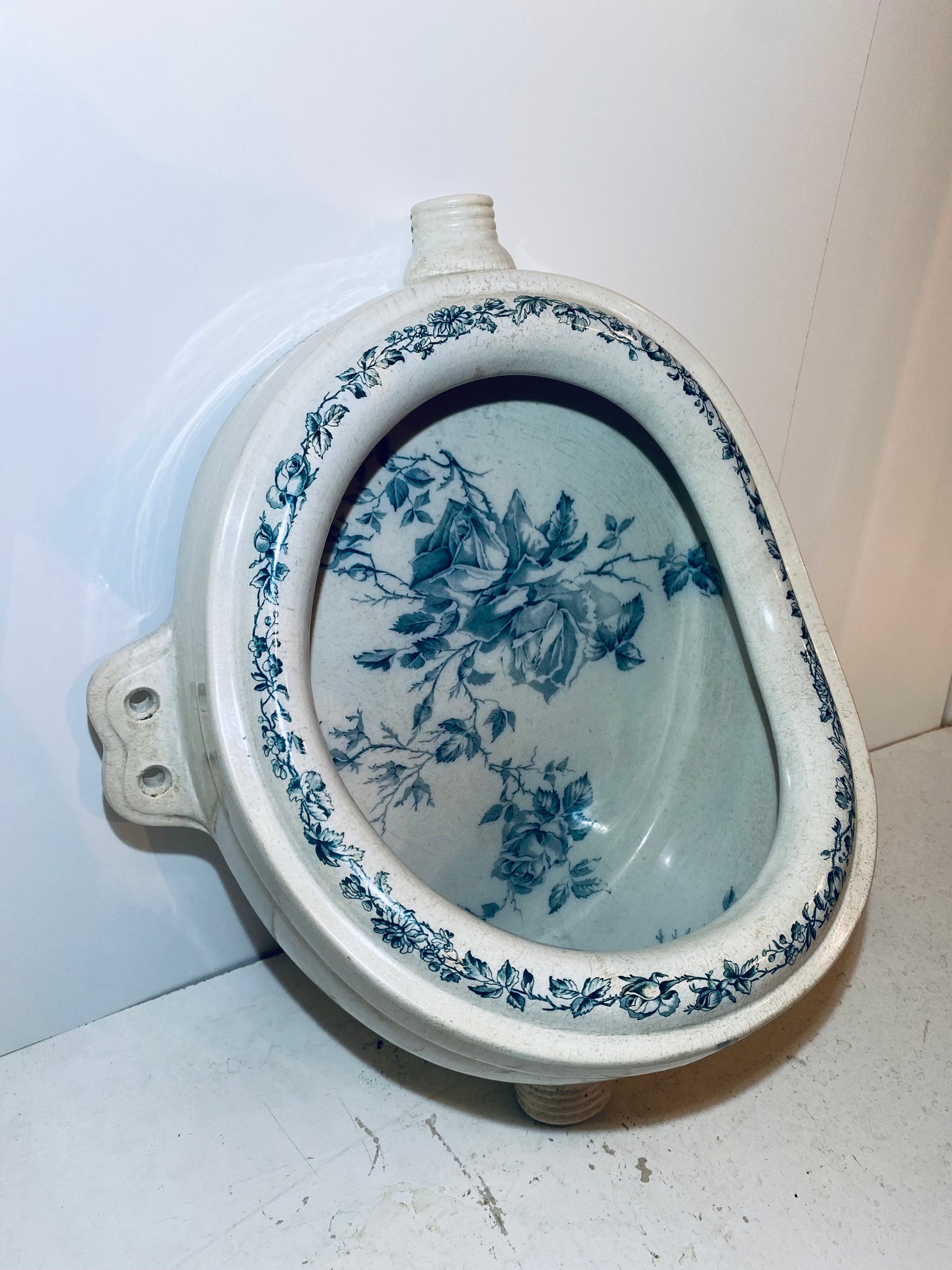 victorian urinal with blue transfers of roses c.1890