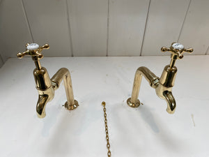 fully restored edwardian vintage bib taps mounted on new brass pedestals