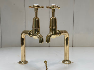 fully restored edwardian vintage bib taps mounted on new brass pedestals
