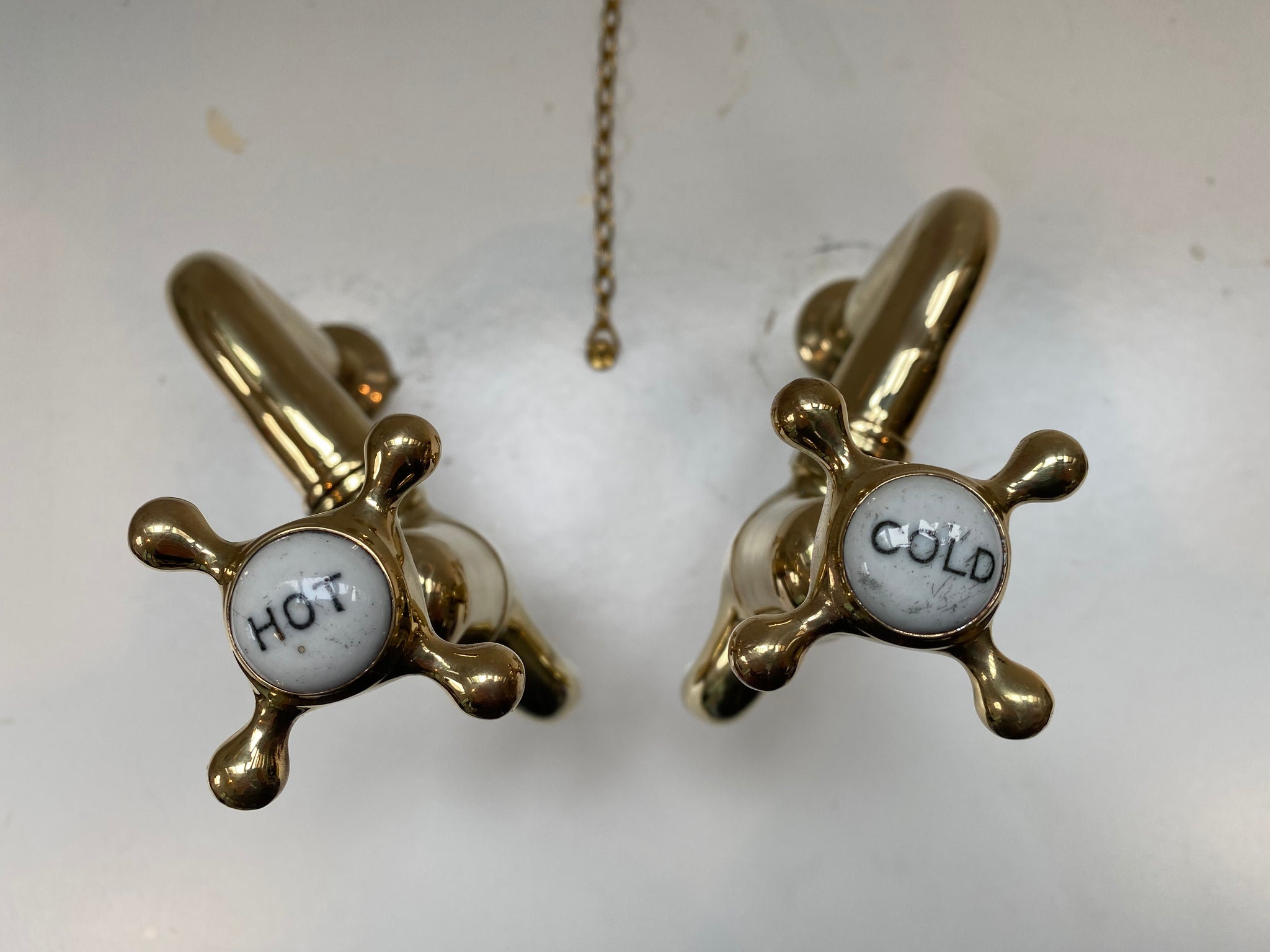 fully restored edwardian vintage bib taps mounted on new brass pedestals