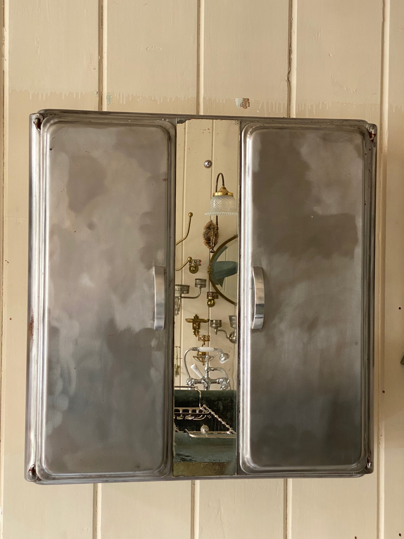 french polished metal bathroom cabinet with mirror and interior shelves c. 1950