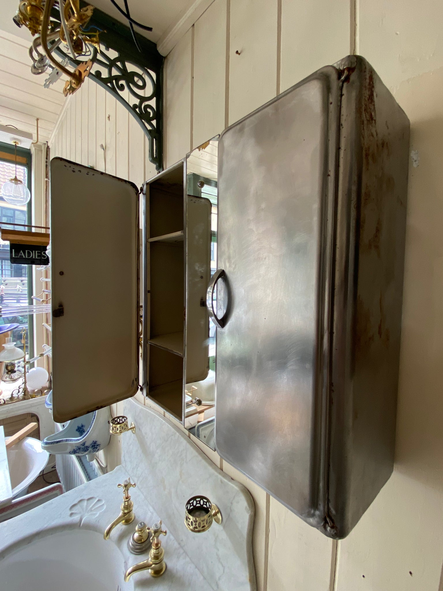 french polished metal bathroom cabinet with mirror and interior shelves c. 1950