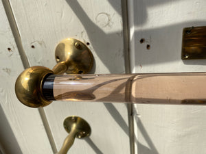 a peach glass towel rail and a pair of silver mirrored grab handles c.1920 peach