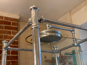 1930's cast iron shower bath with glass screens and chrome plated brassware