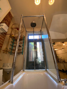 1930's cast iron shower bath with glass screens and chrome plated brassware