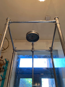 1930's cast iron shower bath with glass screens and chrome plated brassware