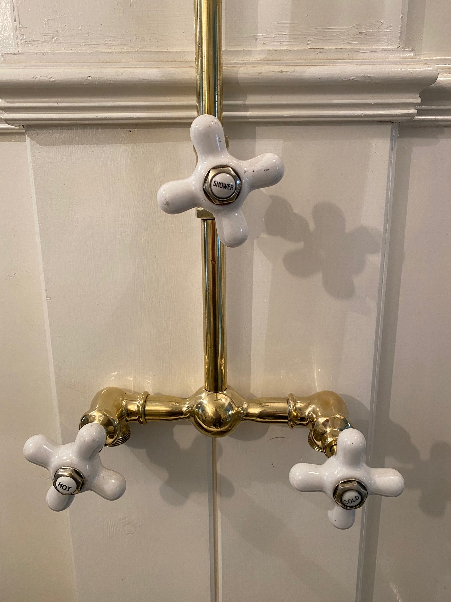 american porcelain-handled wall-fixing shower by american standard c. 1920