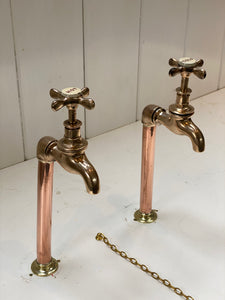 victorian bib-taps on copper pedestals with unusual red lettering c.1890