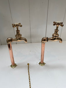 victorian bib-taps on copper pedestals with unusual red lettering c.1890