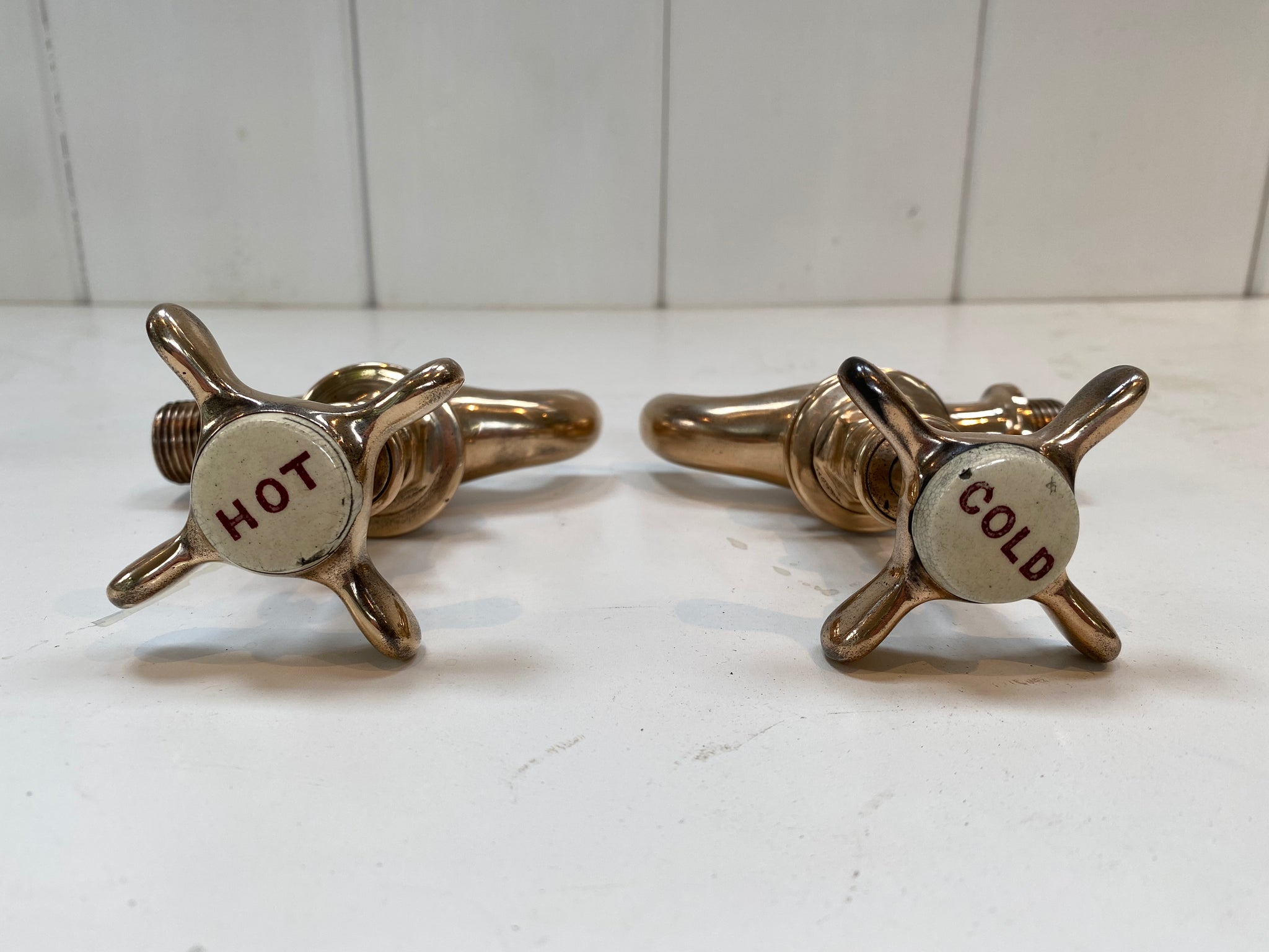 victorian bib-taps on copper pedestals with unusual red lettering c.1890