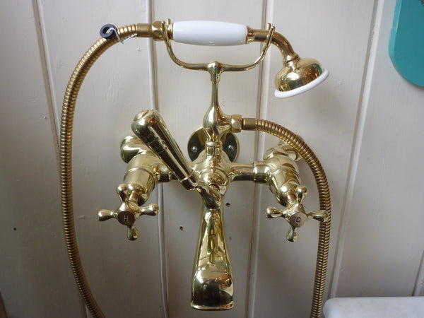 edwardian wall-fixing bath and shower mixer tap.