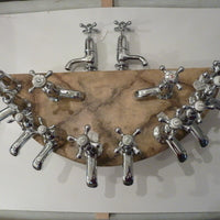 selection of re-chromed vintage basin taps c.1930