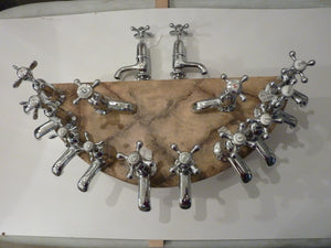 selection of re-chromed vintage basin taps c.1930
