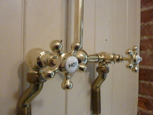 "speakman" of washington, u.s.a wall-fixing brass shower c.1910