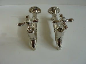 edwardian bib taps with extensions and original wall-mounts in polished nickel plate c.1920