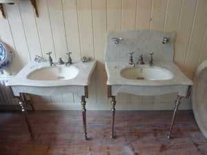 a pair of "simplex" carrara marble basins by j bolding c.1900