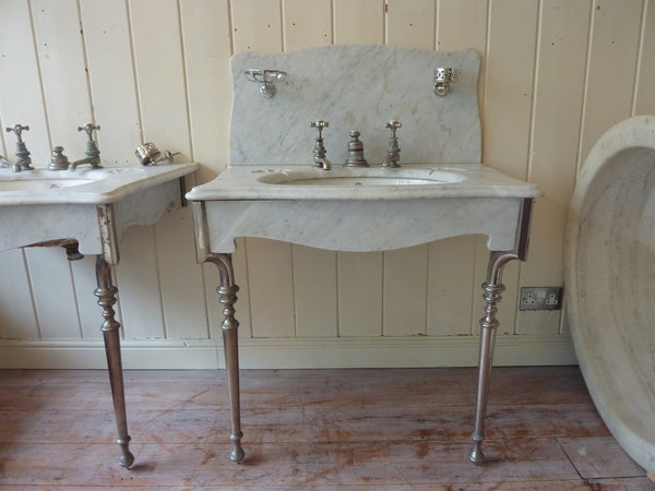 a pair of "simplex" carrara marble basins by j bolding c.1900