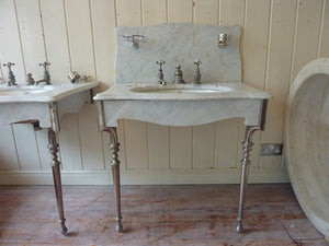a pair of "simplex" carrara marble basins by j bolding c.1900