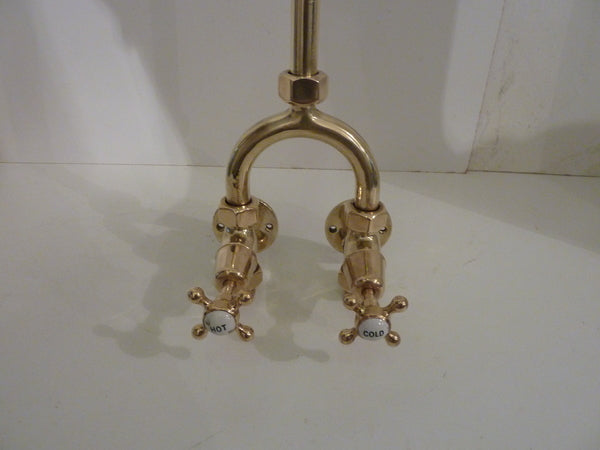 edwardian "wishbone" wall-fixing shower in polished brass